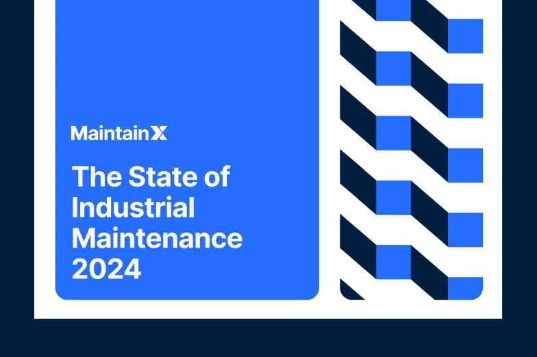 Industrial worker inspecting a large processing plant.