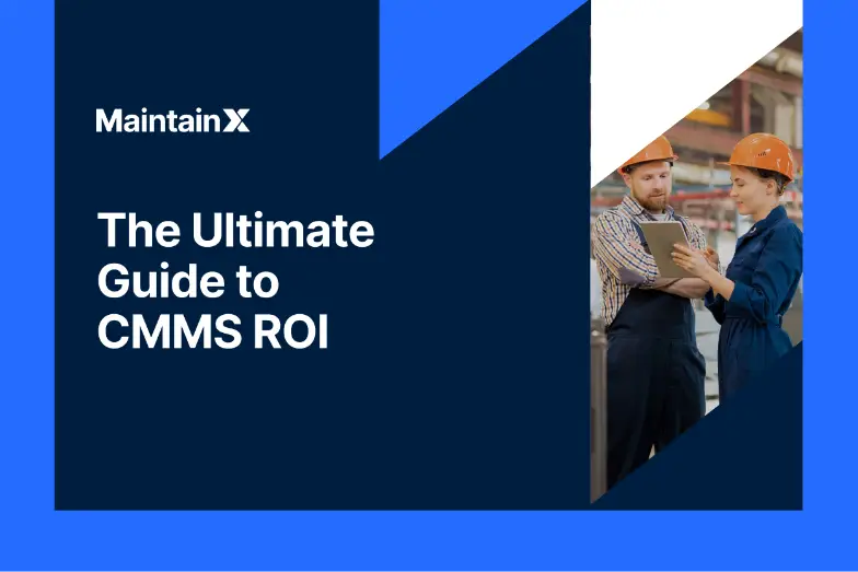 Industrial workers discussing information on a tablet.