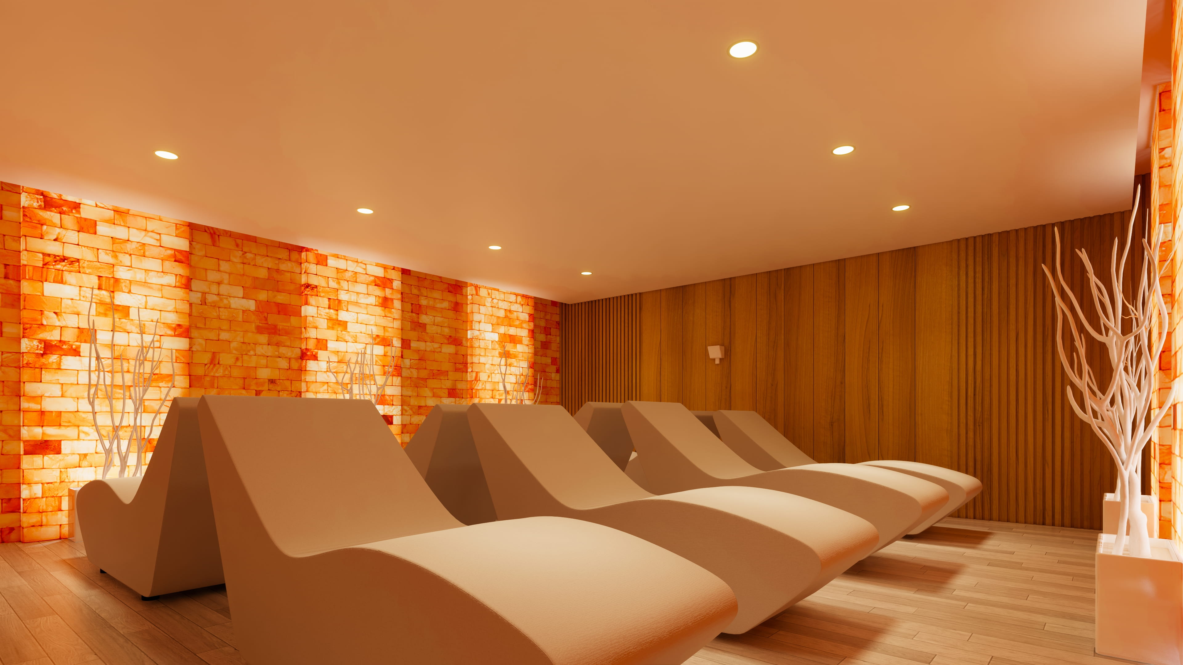 Full custom salt room with backlit Himalayan salt brick walls and lounge seating
