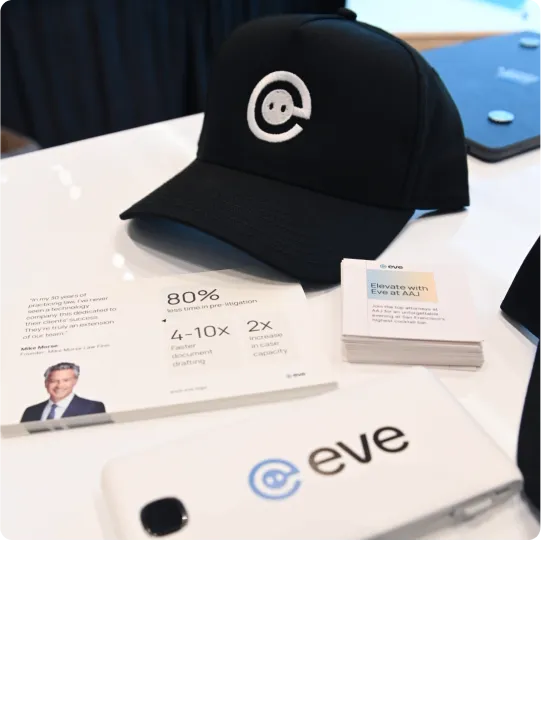 hat with eve logo on it on desk