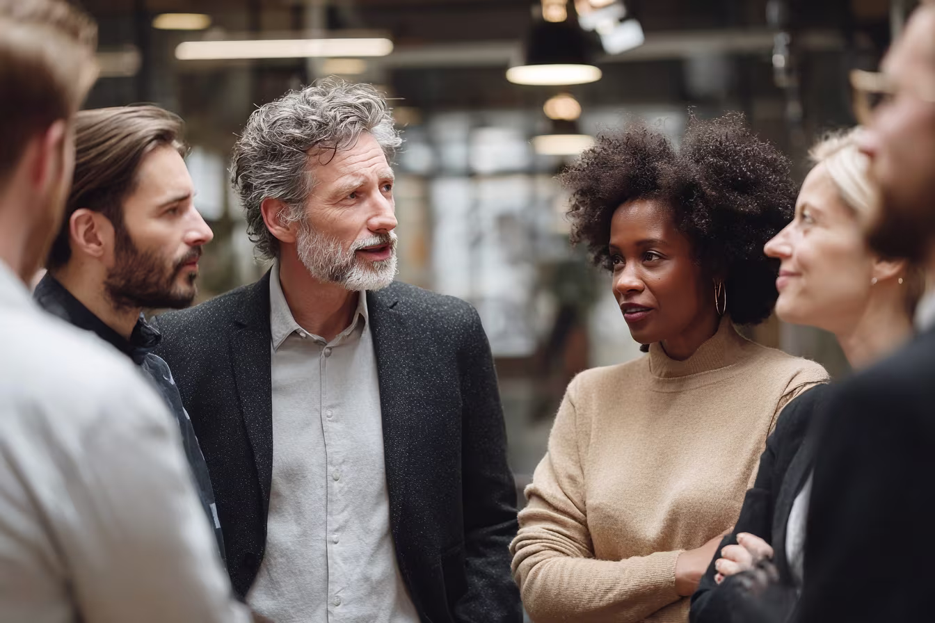 Diverse team discussing business continuity