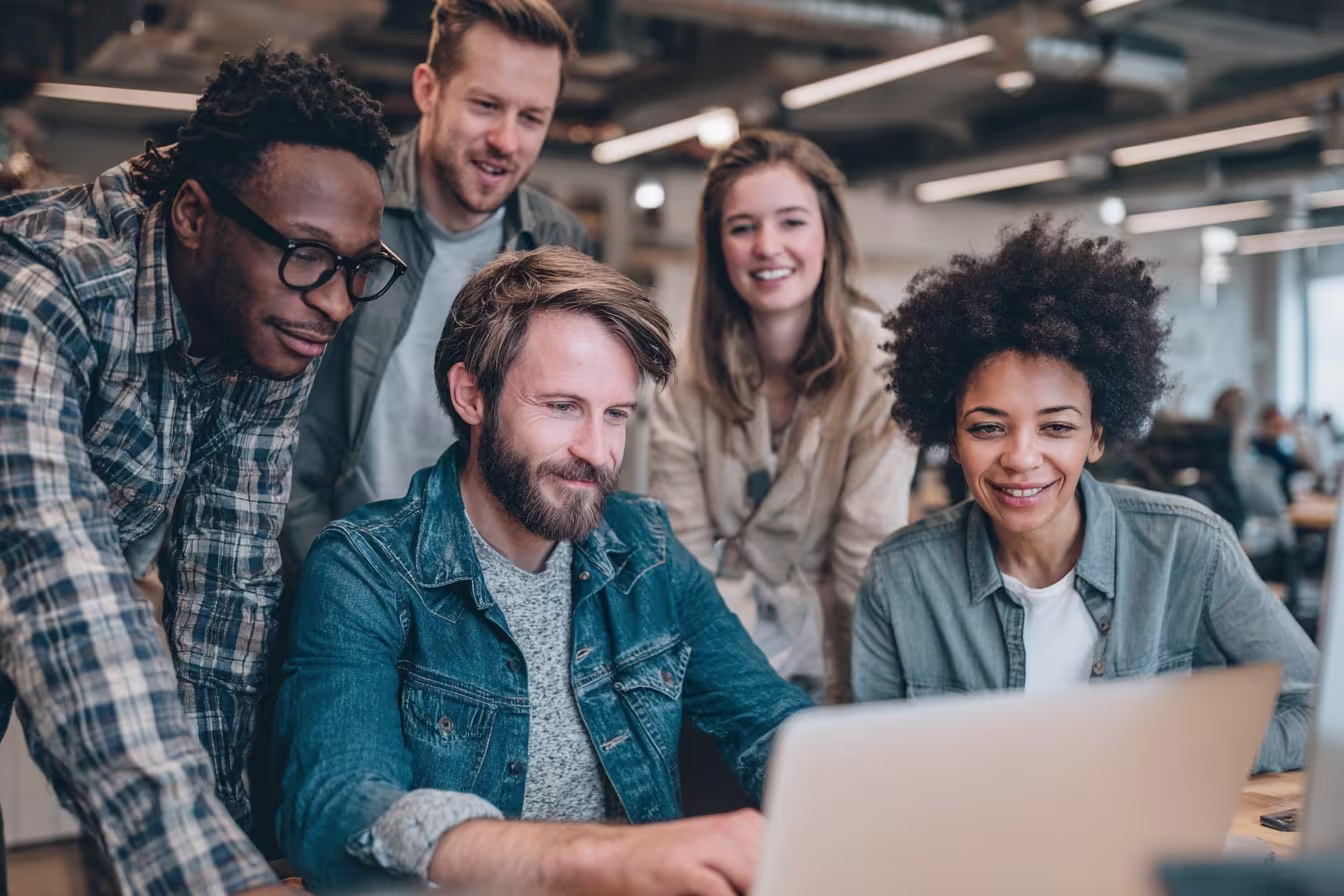 Diverse IT team discussing cloud migration strategy