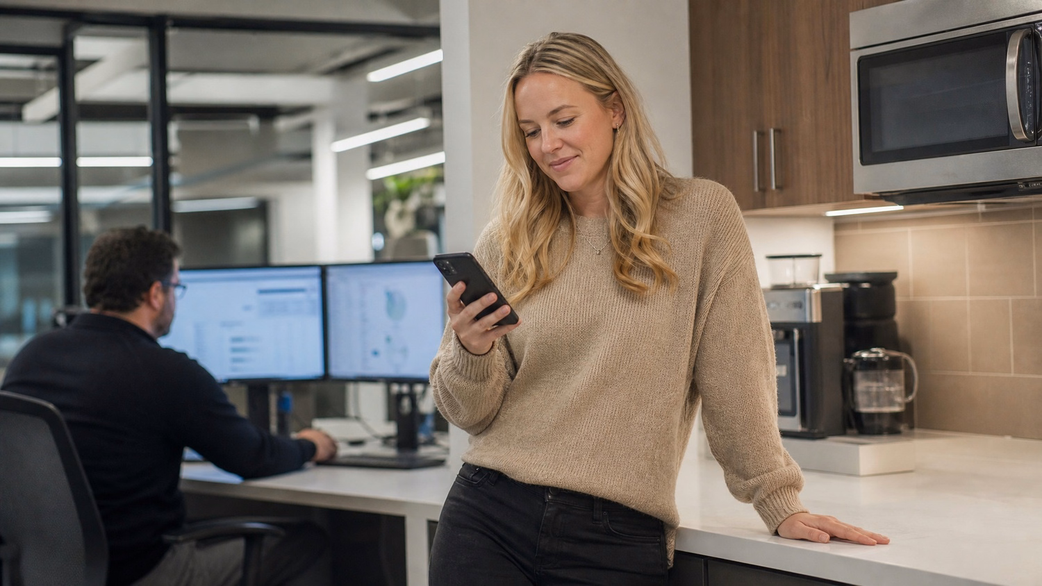 Woman reviews password requirements on phone in kitchen