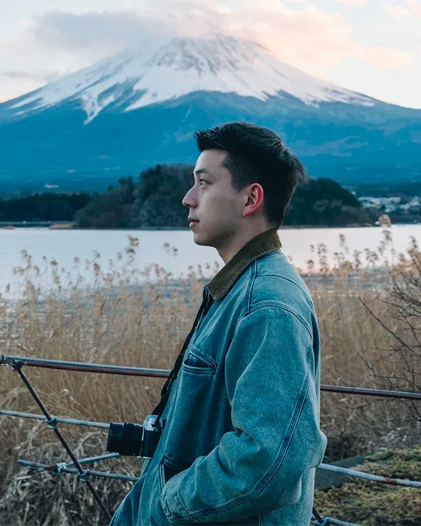 Portrait of Sam Mei in front of Fuji Mountain.