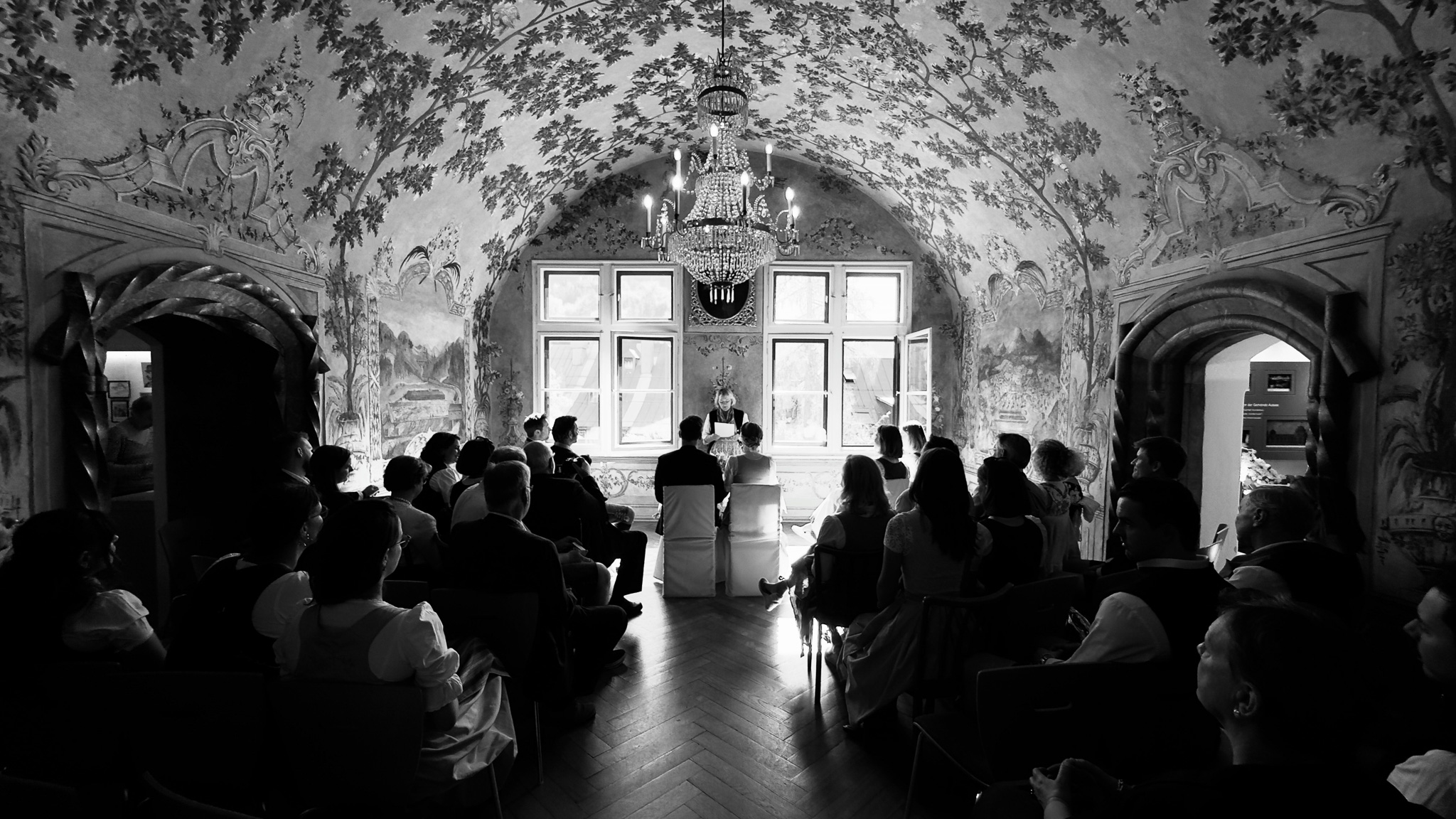 Eternal Moments: A Wedding Photography Collection by FADETOBLACK, wedding photography: Black and white photograph of the ceremony in a frescoed hall