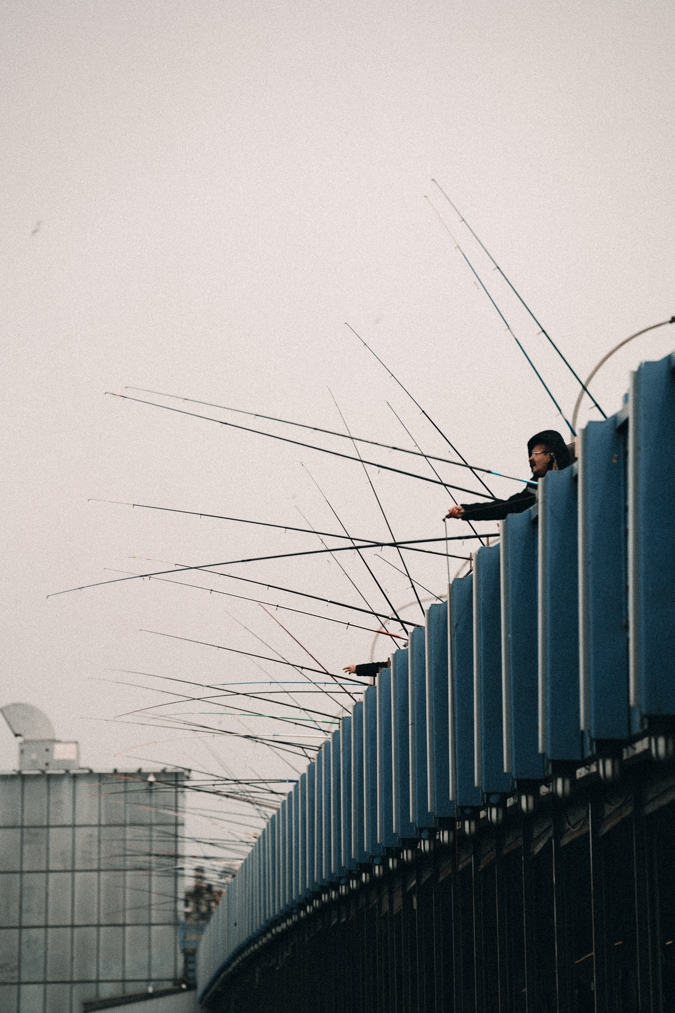 Fragments of Istanbul by FADETOBLACK, street photography, image 13: Street scenes from Istanbul: an elderly man clasping prayer beads behind his back, a cargo ship passing a