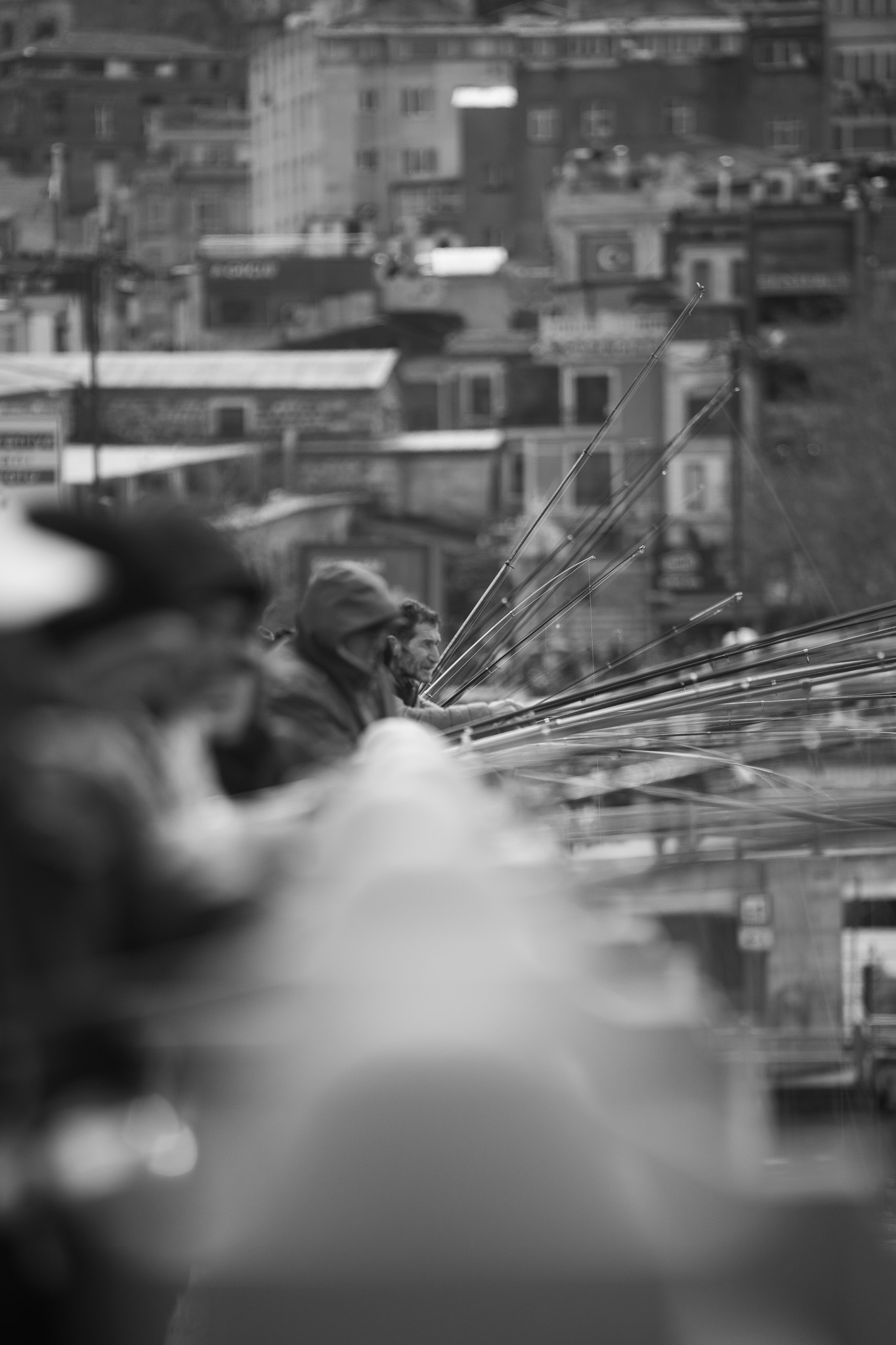 Fragments of Istanbul by FADETOBLACK, street photography, image 8: Street scenes from Istanbul: an elderly man clasping prayer beads behind his back, a cargo ship passing a