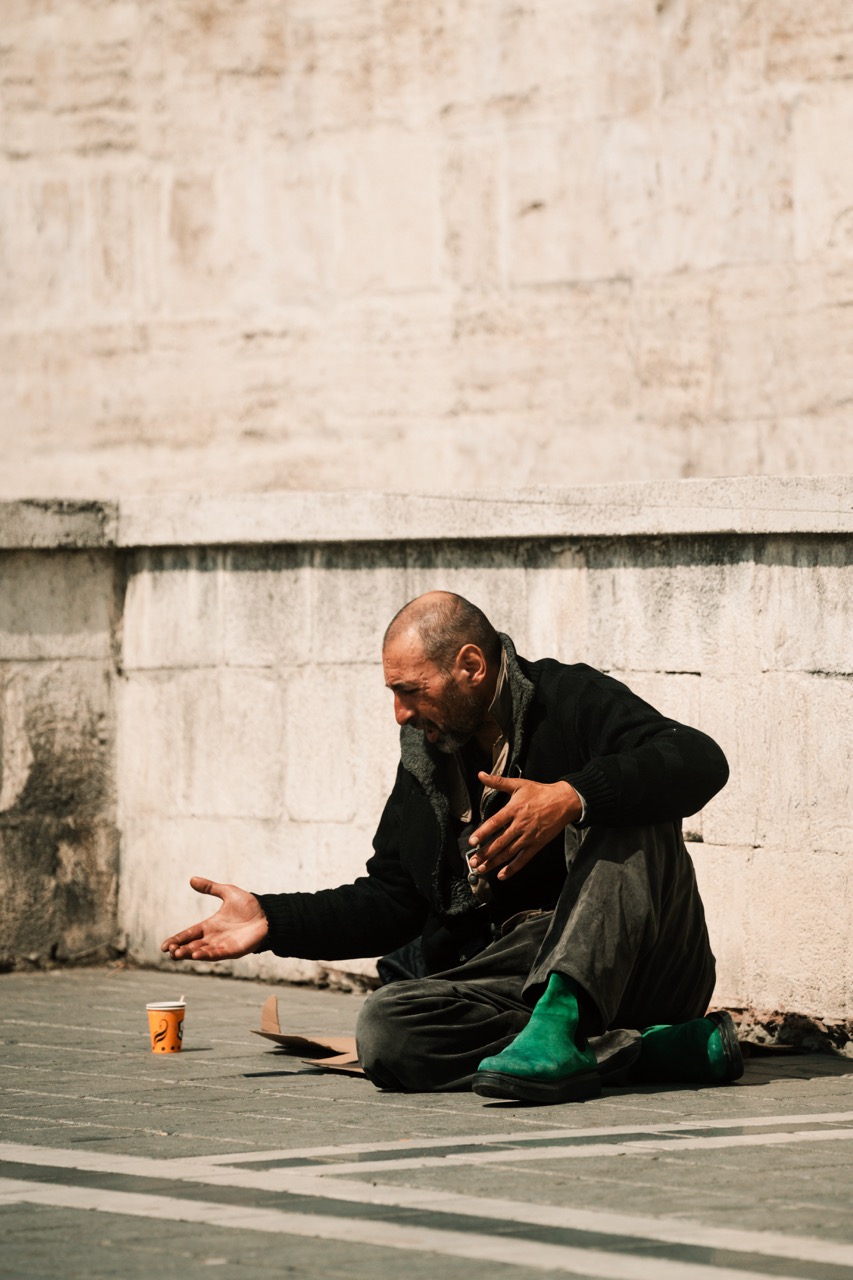 Fragments of Istanbul by FADETOBLACK, street photography, image 18: Street scenes from Istanbul: an elderly man clasping prayer beads behind his back, a cargo ship passing a