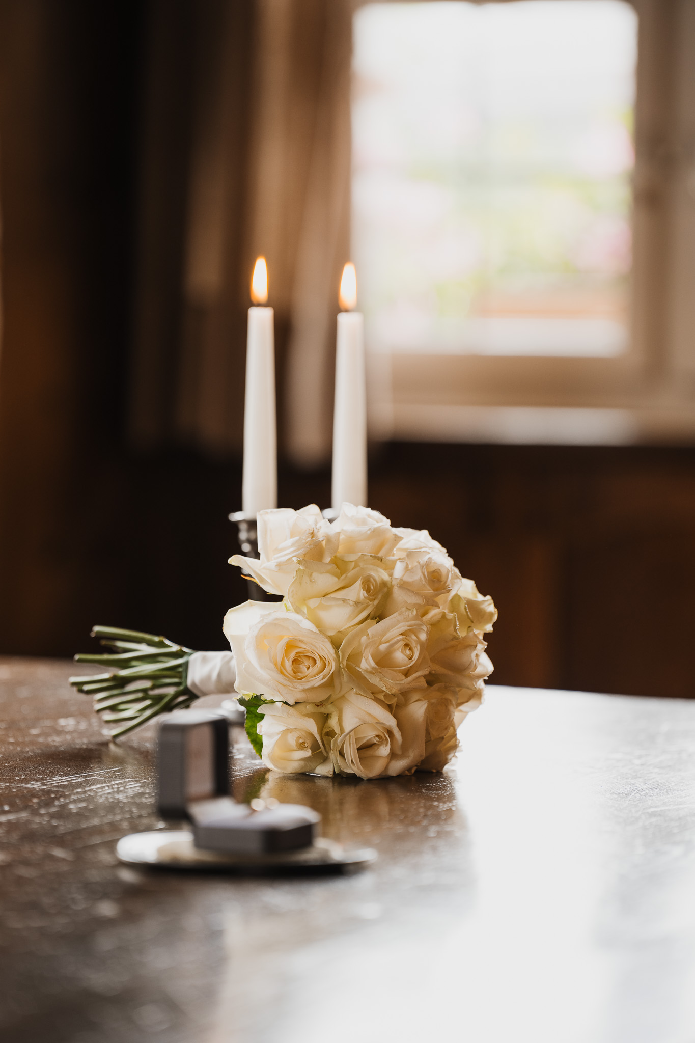 Eternal Moments: A Wedding Photography Collection by FADETOBLACK, wedding photography, image 20: Wedding series mixing black and white and color: a bride in a lace puff-sleeve dress beside a vintage car