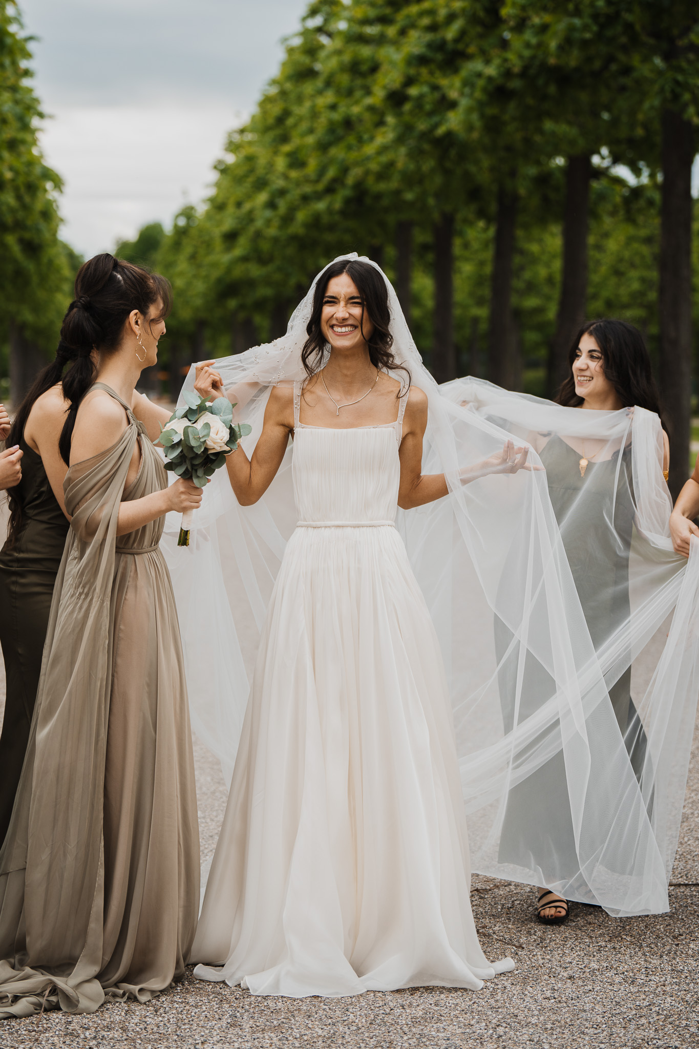 Eternal Moments: A Wedding Photography Collection by FADETOBLACK, wedding photography, image 17: Wedding series mixing black and white and color: a bride in a lace puff-sleeve dress beside a vintage car