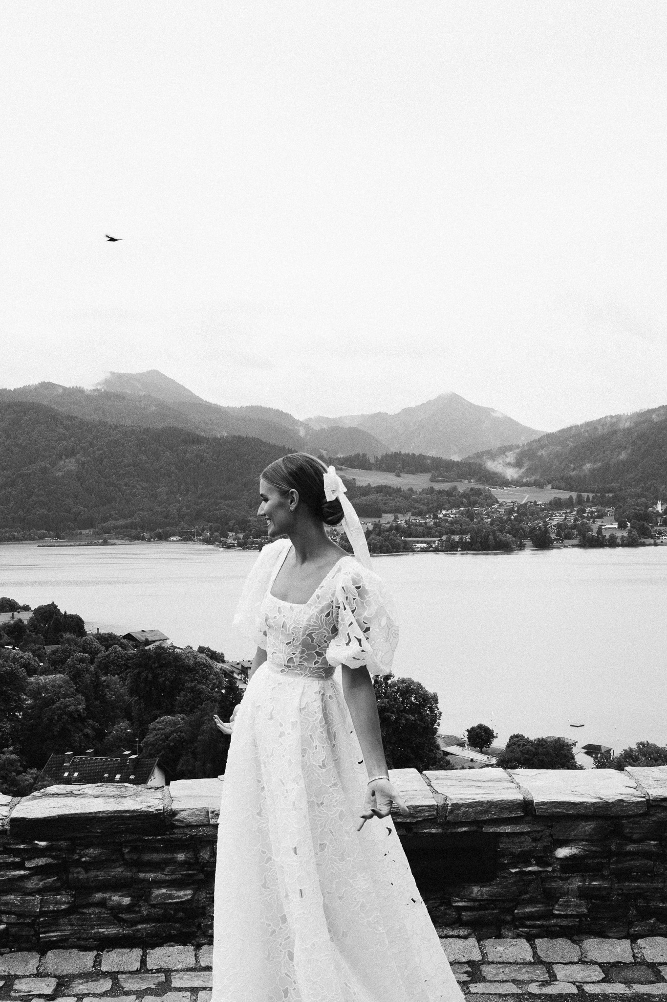 Eternal Moments: A Wedding Photography Collection by FADETOBLACK, wedding photography, image 22: Wedding series mixing black and white and color: a bride in a lace puff-sleeve dress beside a vintage car