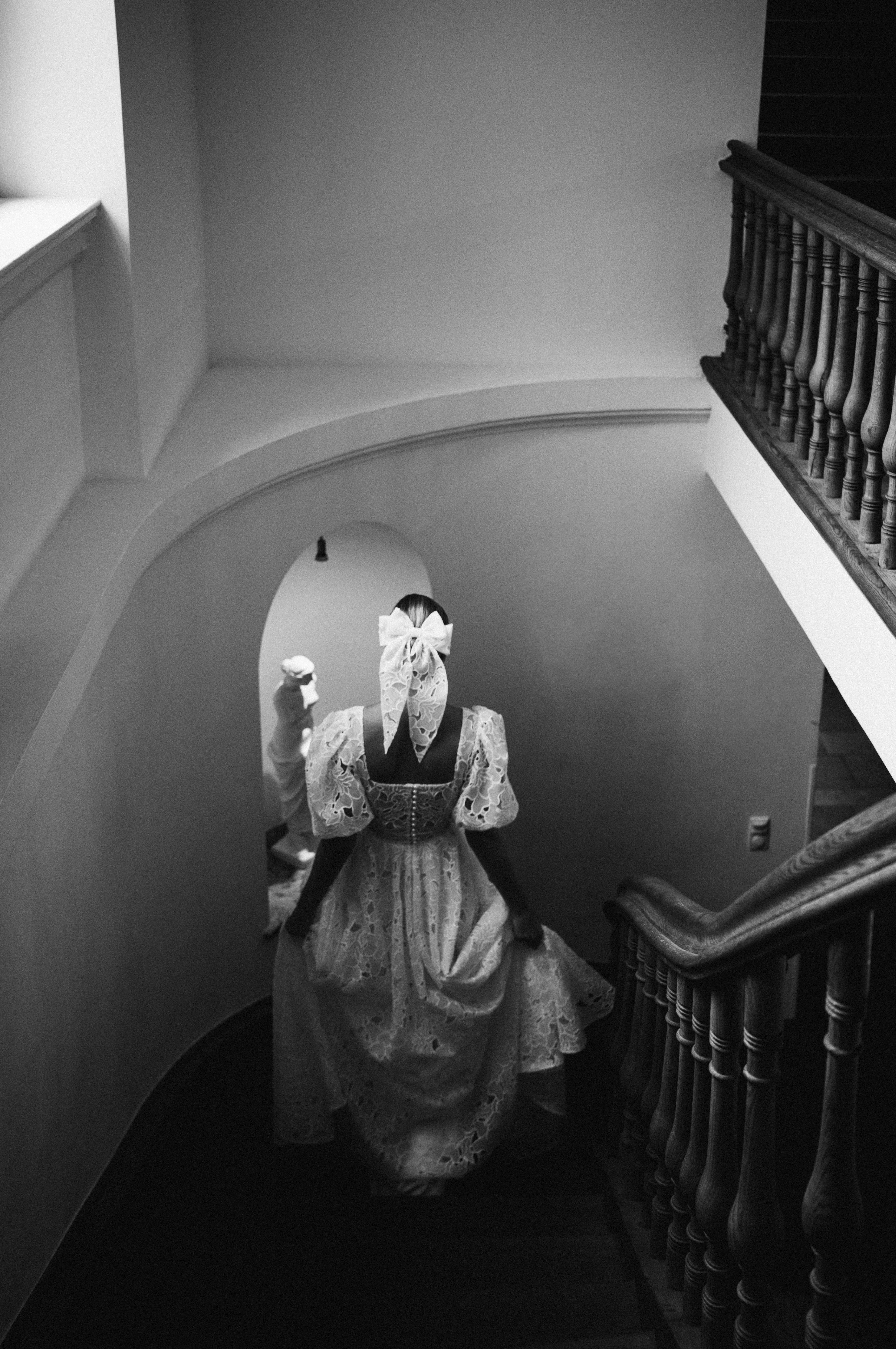 Eternal Moments: A Wedding Photography Collection by FADETOBLACK, wedding photography, image 9: Wedding series mixing black and white and color: a bride in a lace puff-sleeve dress beside a vintage car