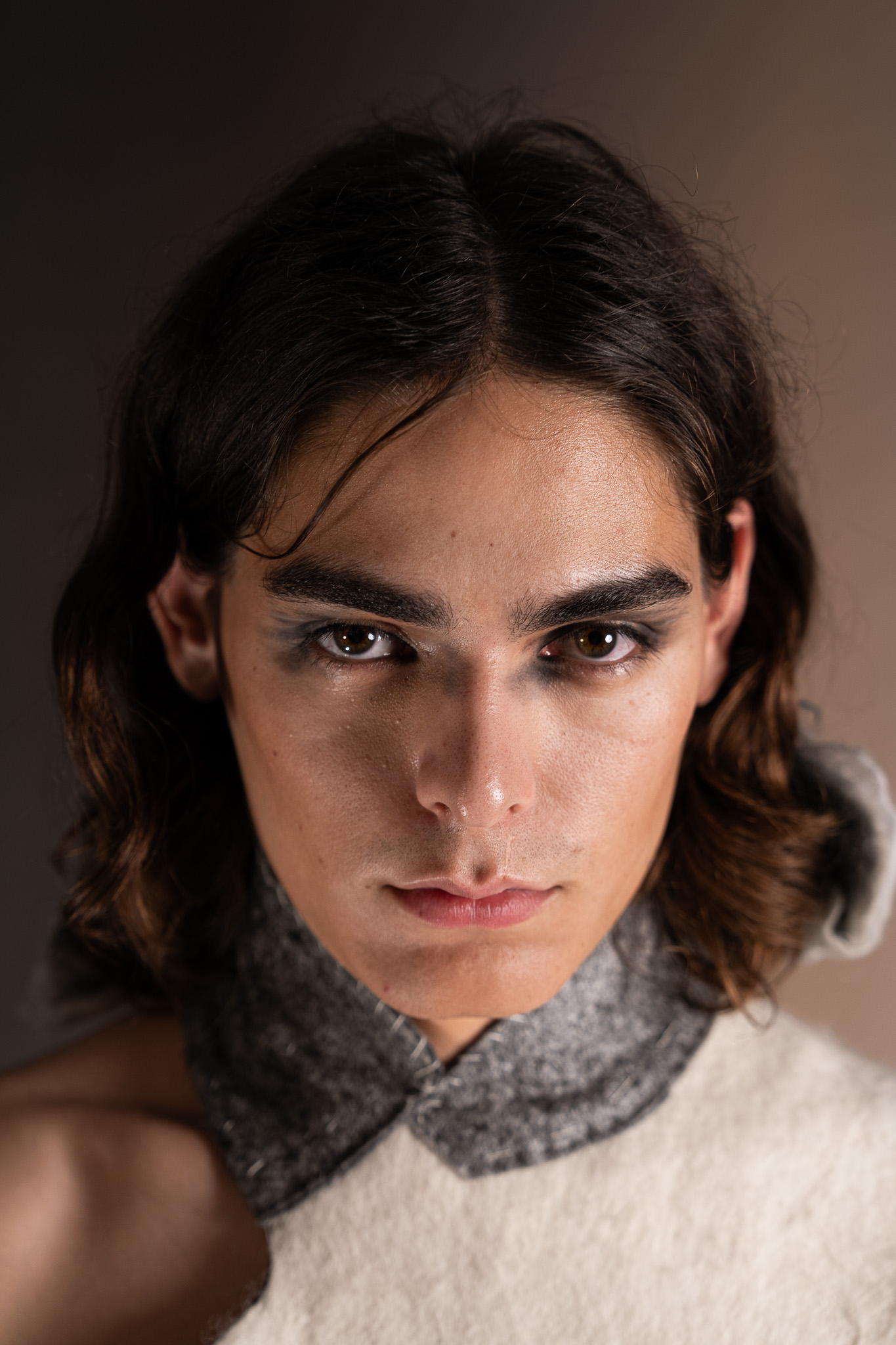 Laurin Schuler by FADETOBLACK, fashion editorial photography, image 13: Studio editorial for a designer collection: models wear sculptural hooded collar pieces in grey and