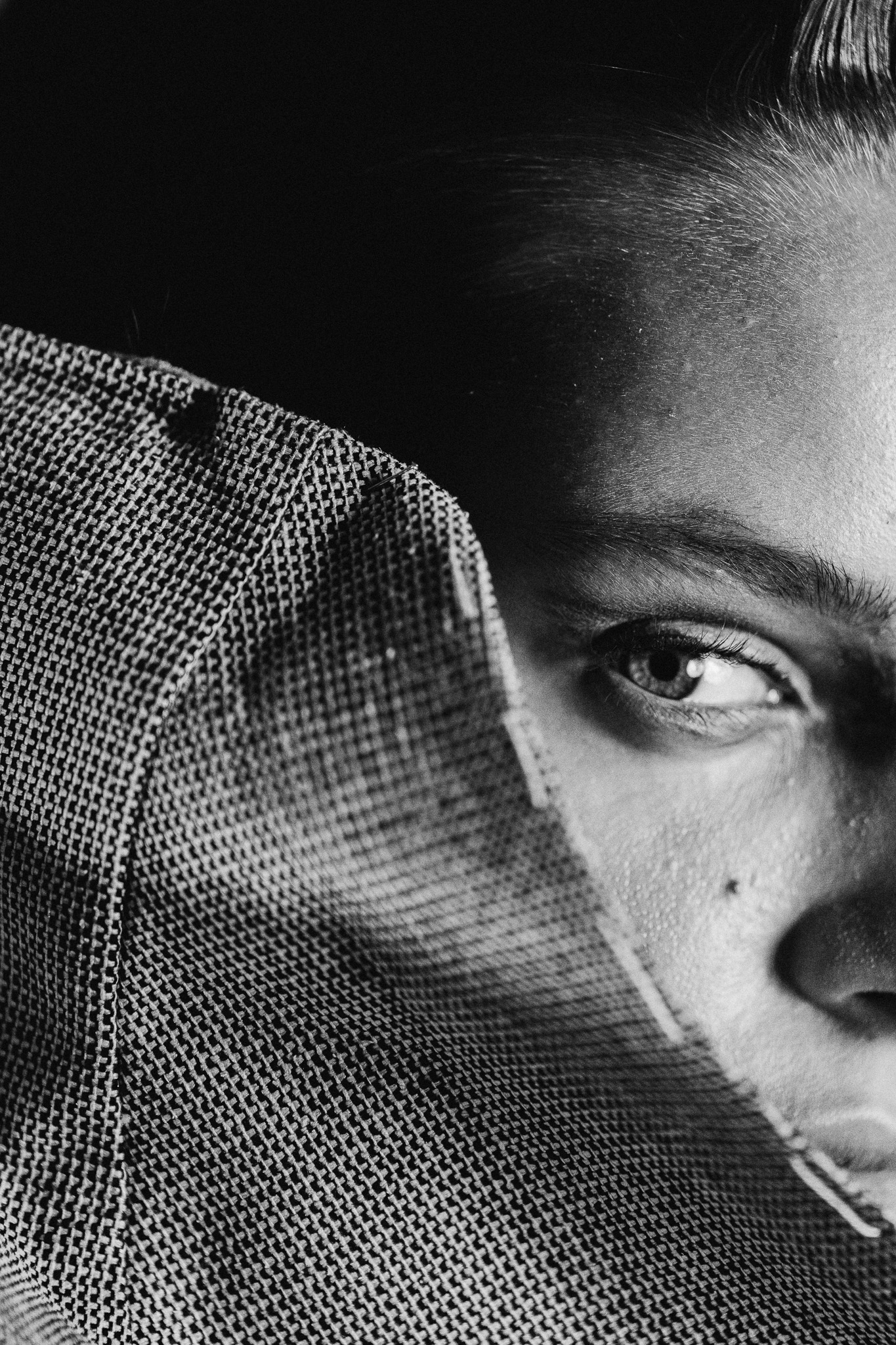 Laurin Schuler by FADETOBLACK, fashion editorial photography, image 12: Studio editorial for a designer collection: models wear sculptural hooded collar pieces in grey and