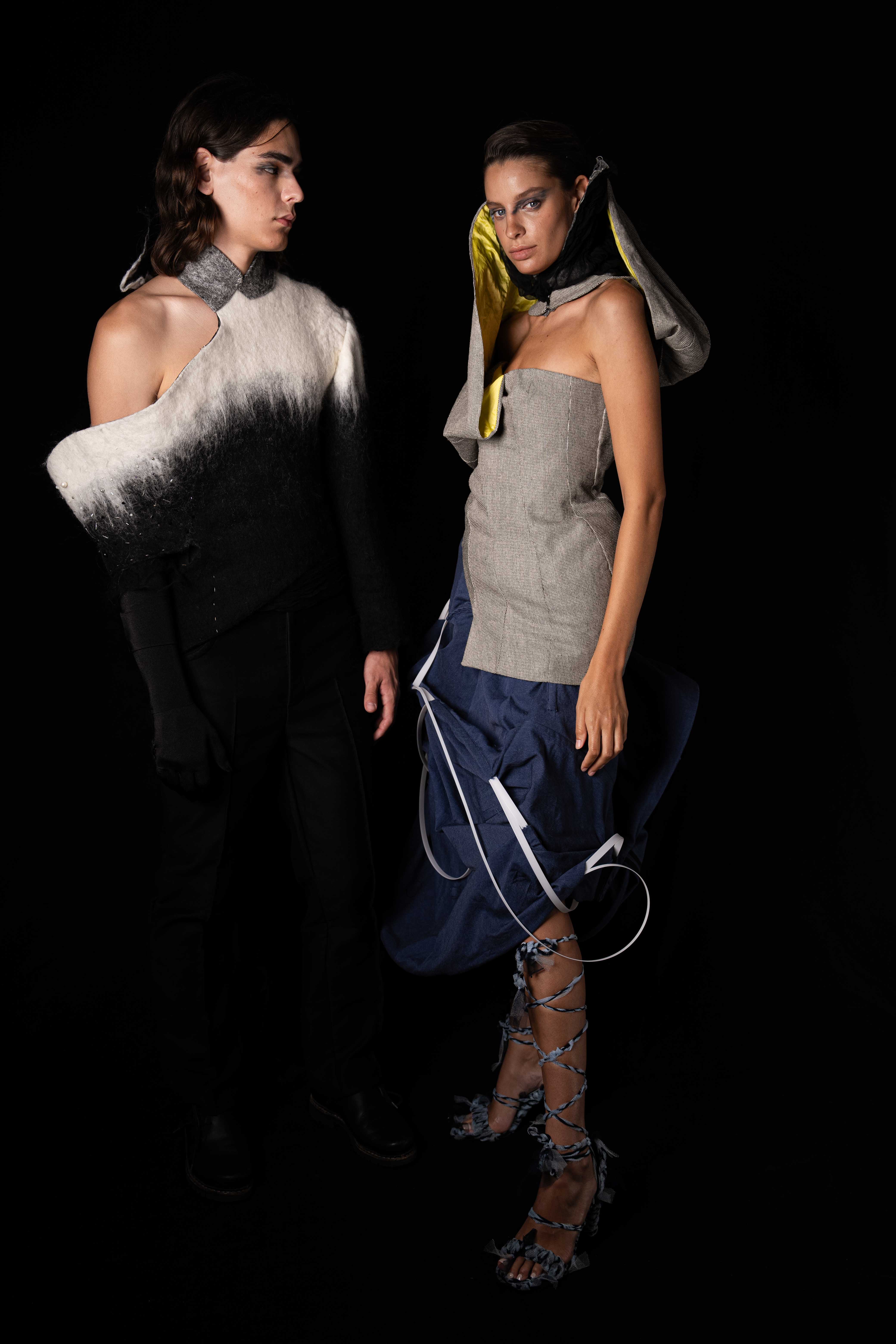 Laurin Schuler by FADETOBLACK, fashion editorial photography, image 18: Studio editorial for a designer collection: models wear sculptural hooded collar pieces in grey and