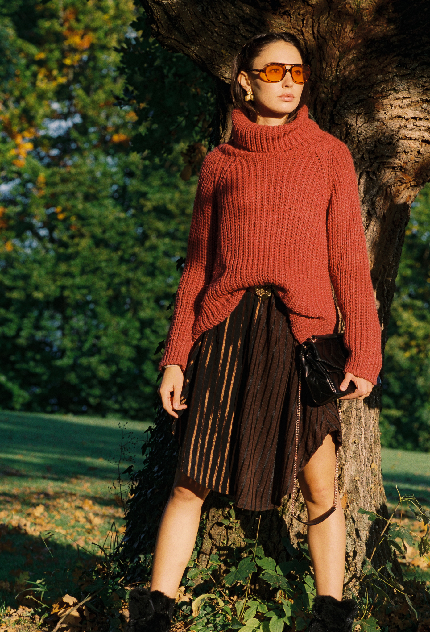 Emily: Autumn Elegance by FADETOBLACK, outdoor portrait photography, image 8: Autumn lakeside portrait series of a young woman with long brown hair wearing a mustard yellow knit and dress