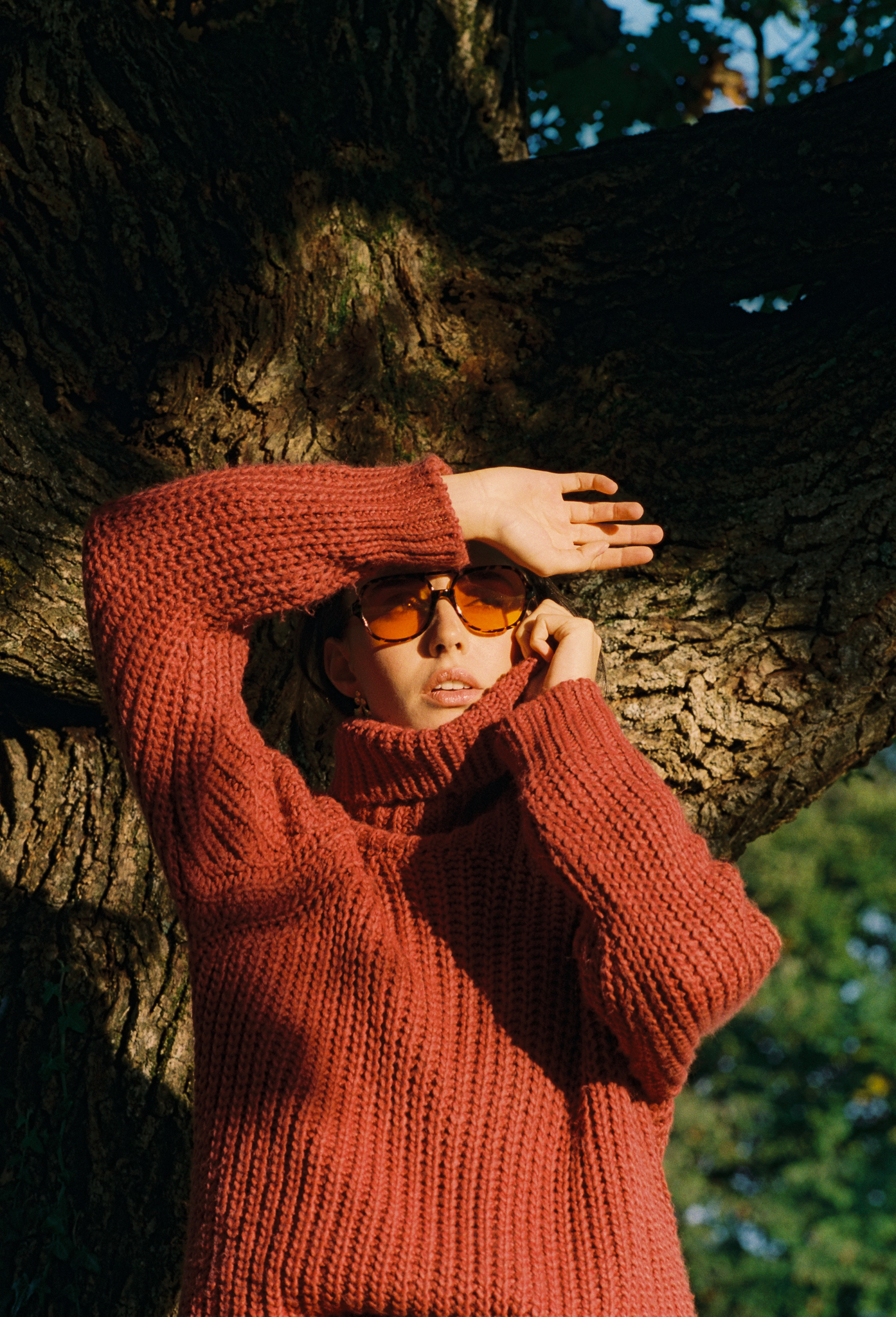 Emily: Autumn Elegance by FADETOBLACK, outdoor portrait photography, image 6: Autumn lakeside portrait series of a young woman with long brown hair wearing a mustard yellow knit and dress