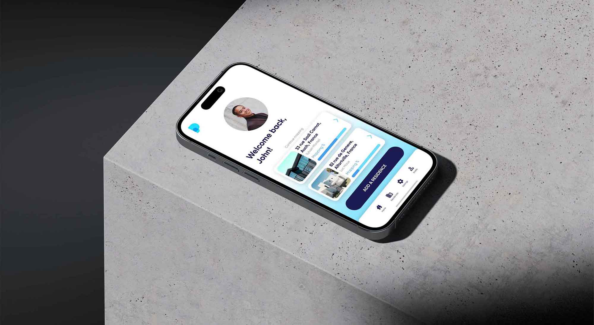 Single smartphone with an app screen on a concrete surface, symbolic image for single image posts, FADETOBLACK Munich