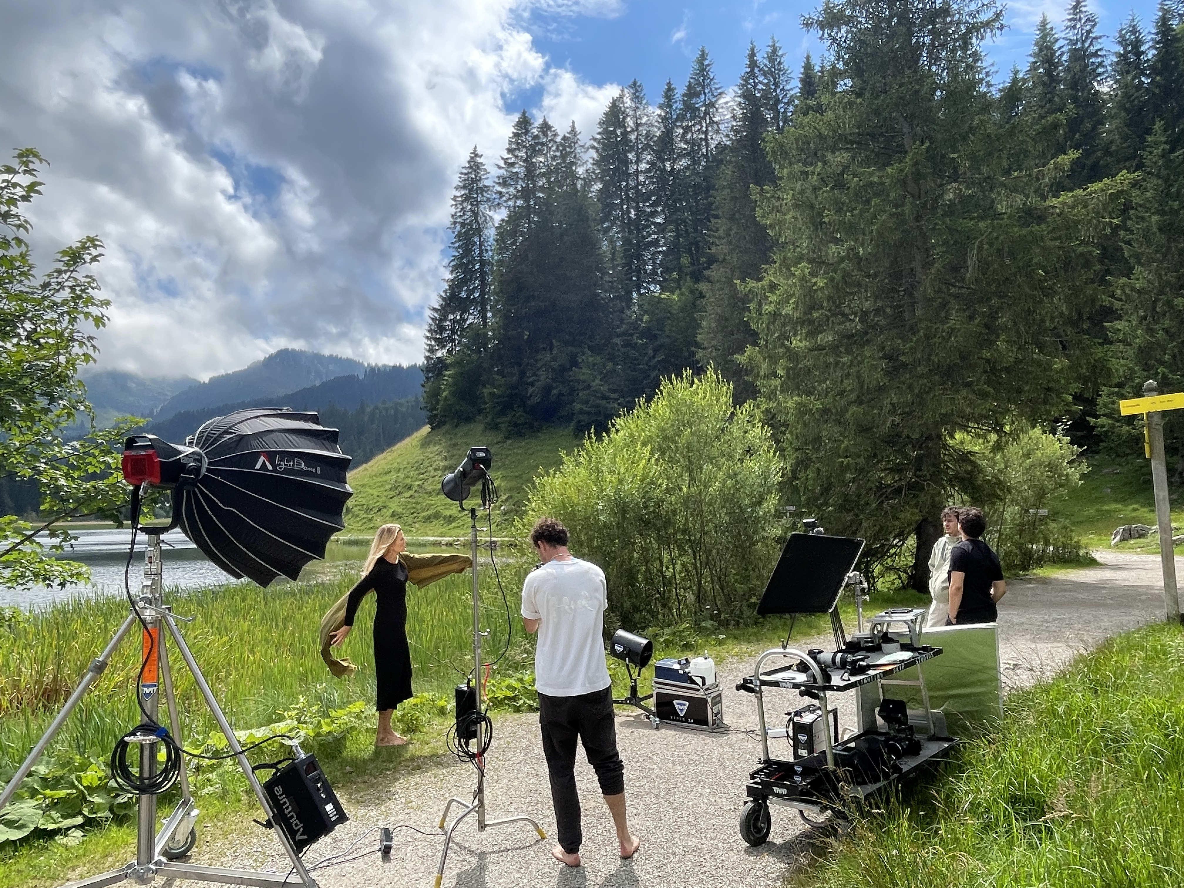 FADETOBLACK film crew shooting a fashion campaign in the Bavarian Alps, symbolic image for social media marketing costs, FADETOBLACK Munich