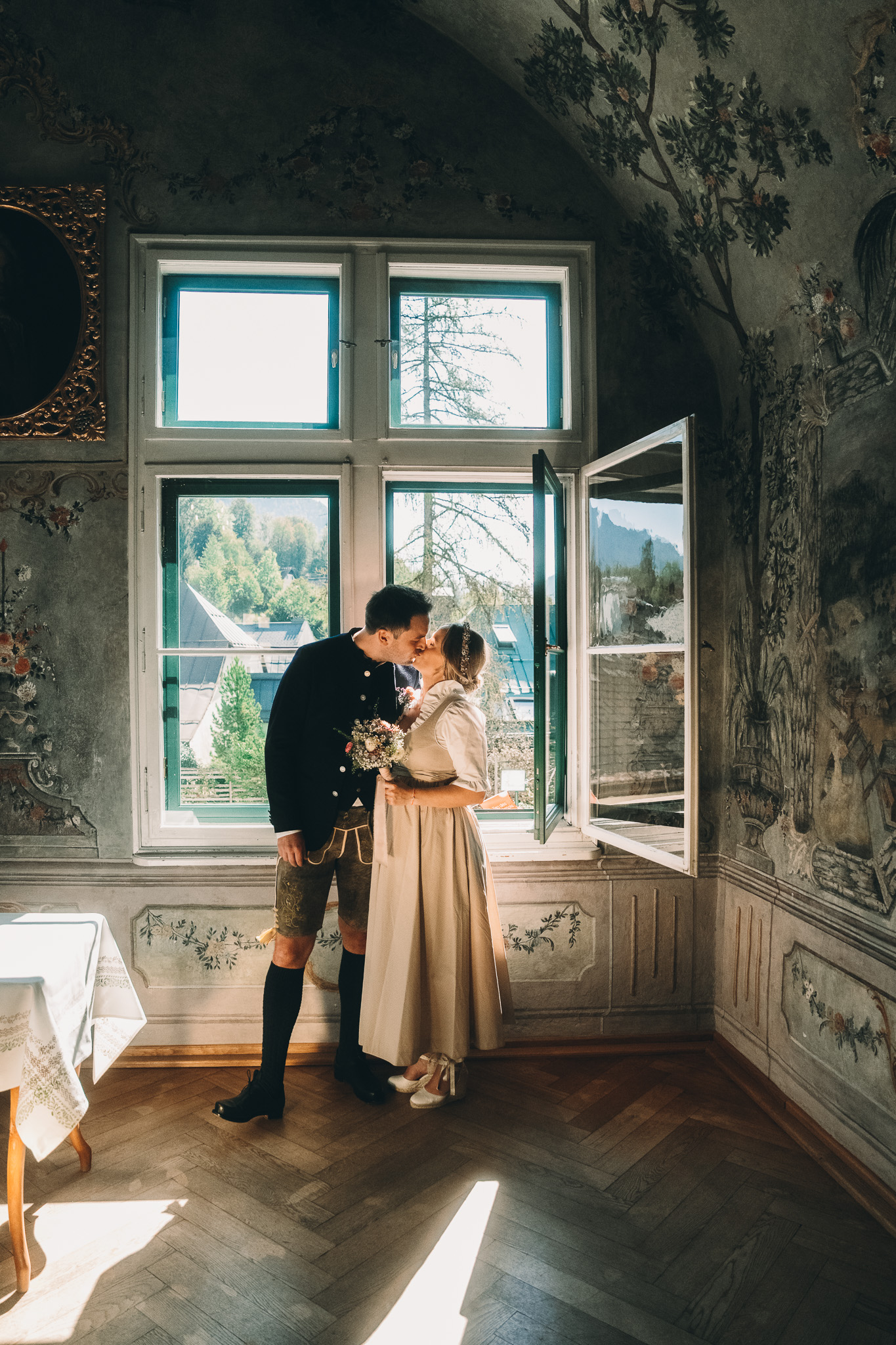 Eternal Moments: A Wedding Photography Collection by FADETOBLACK, wedding photography: Couple embracing in a doorway with green shutters