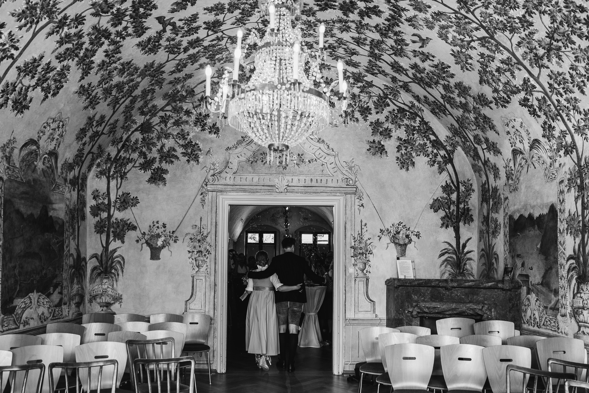 Eternal Moments: A Wedding Photography Collection by FADETOBLACK, wedding photography: Black and white photograph of the couple framed in an ornate doorway