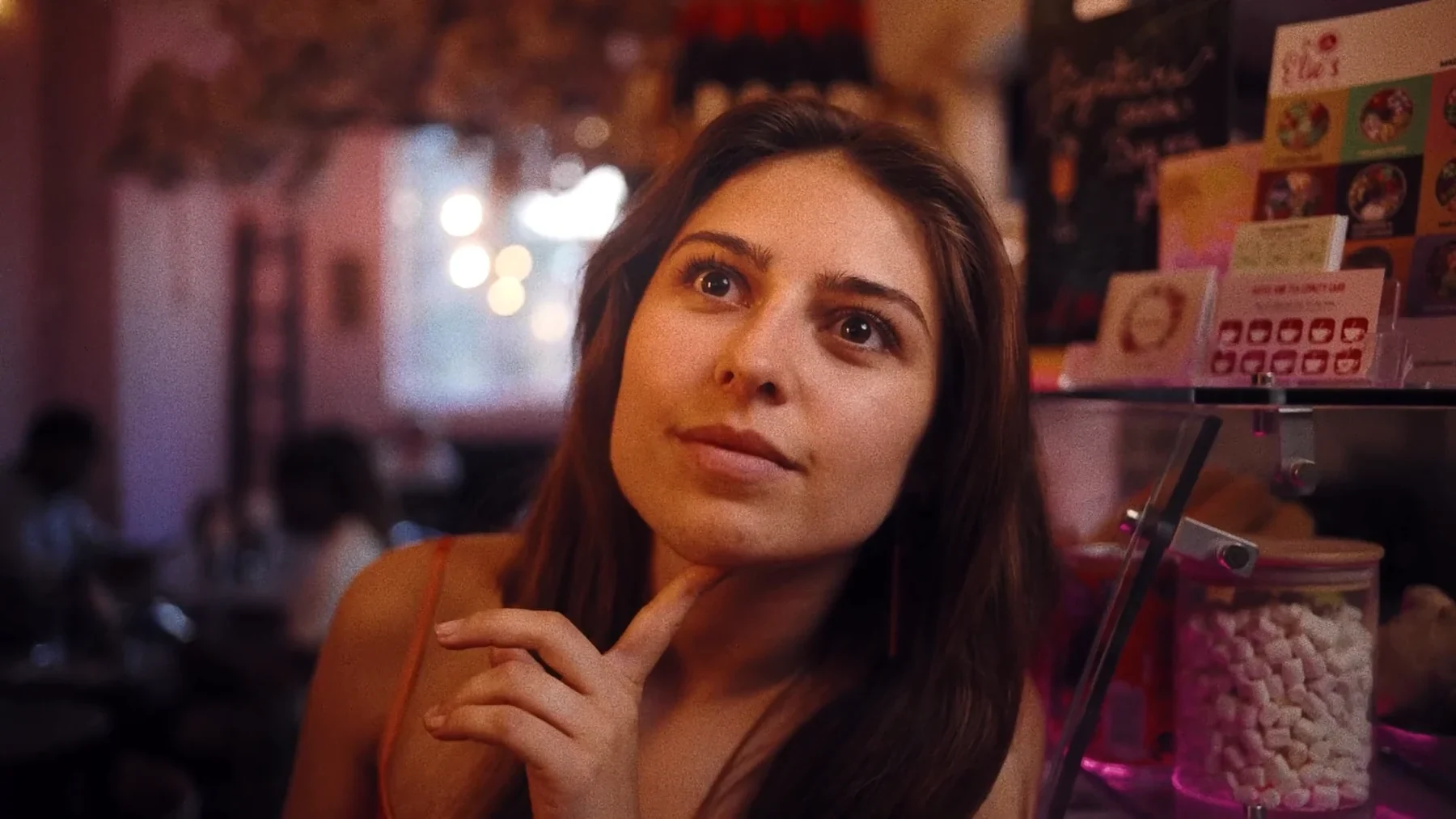 Trust Me - Nicole Schretlen Montes as Anne in a warmly lit shop