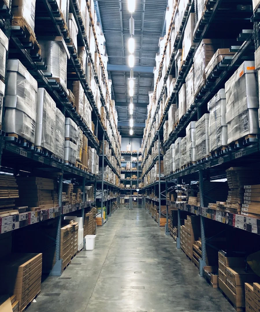 Workers in a large distribution centre warehouse