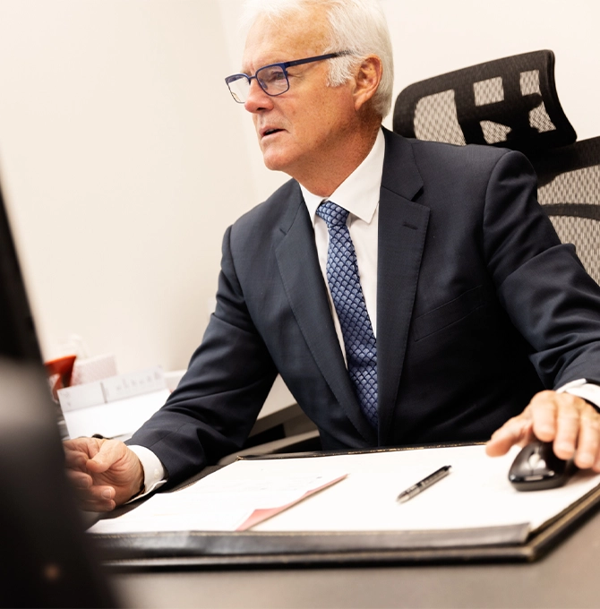 Peter Carew, our director, hard at work in our Melbourne offices, where you can work with our family court lawyers.