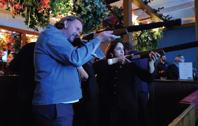 Clients and team enjoying a festive networking evening at Clays in Soho with cocktails and conversation.