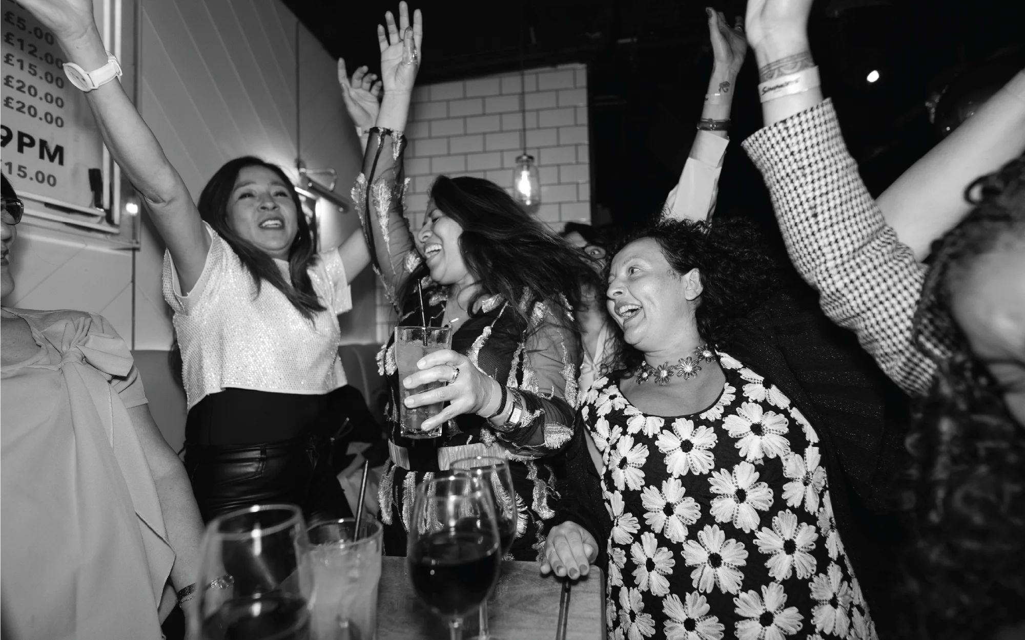 Whole Distinct team gathered at the annual Christmas party—staff from all roles celebrating with an open bar, pizza, and raffle prizes.