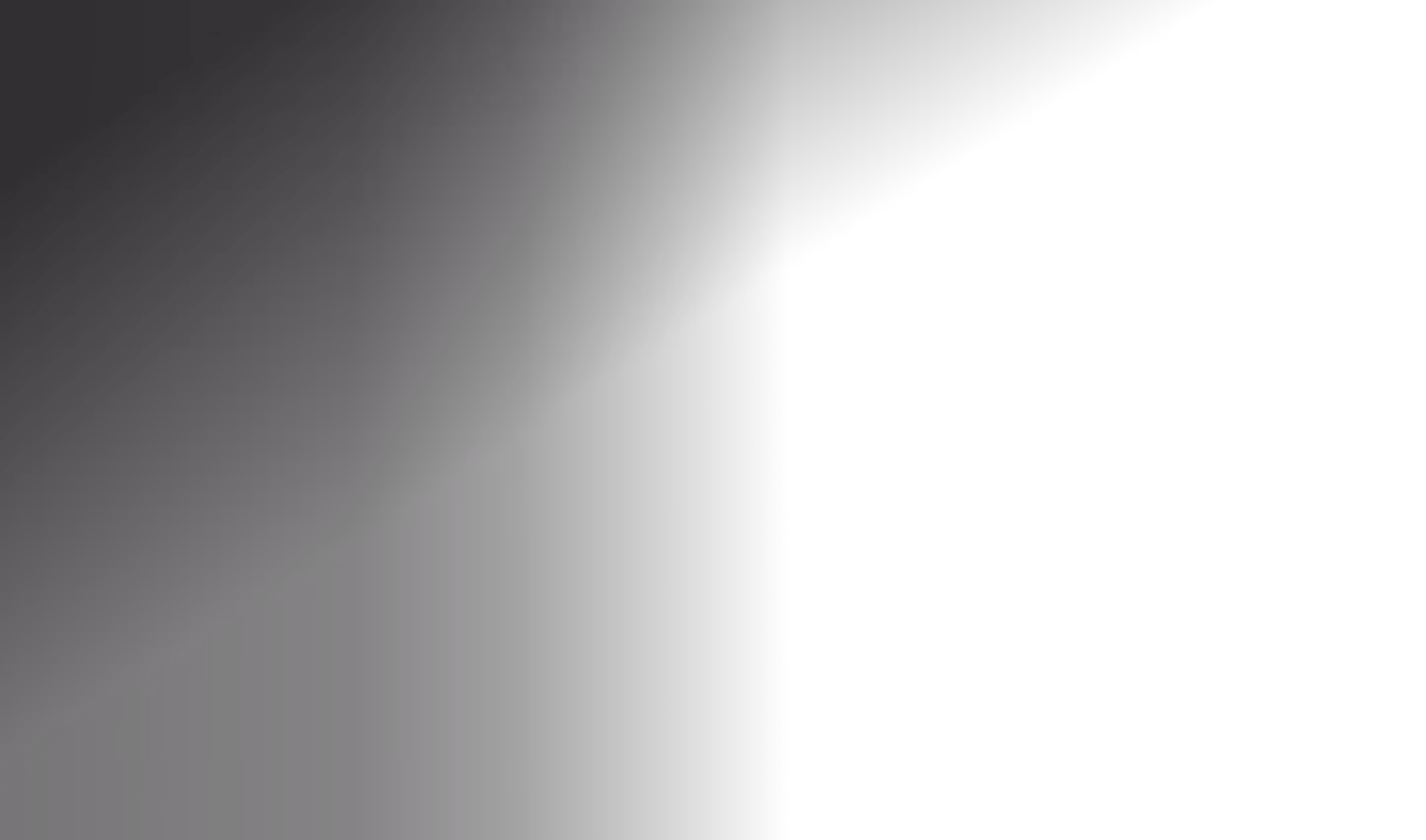 Partial view of a dark geometric shape outlined by thin white edges forming a sharp corner.