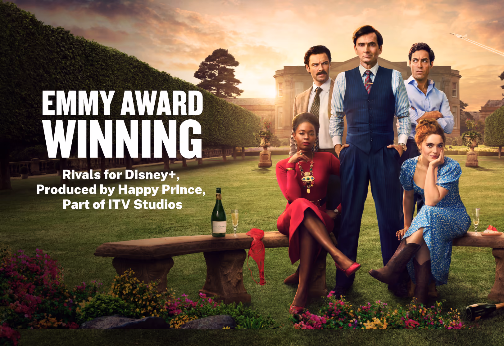 Five characters posed in a garden with a mansion in the background, promoting Emmy-winning show Rivals for Disney+.