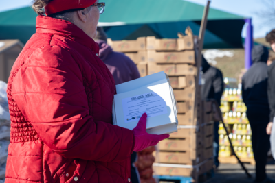 A volunteer helps distribute frozen meals in Nicholas County, Kentucky.