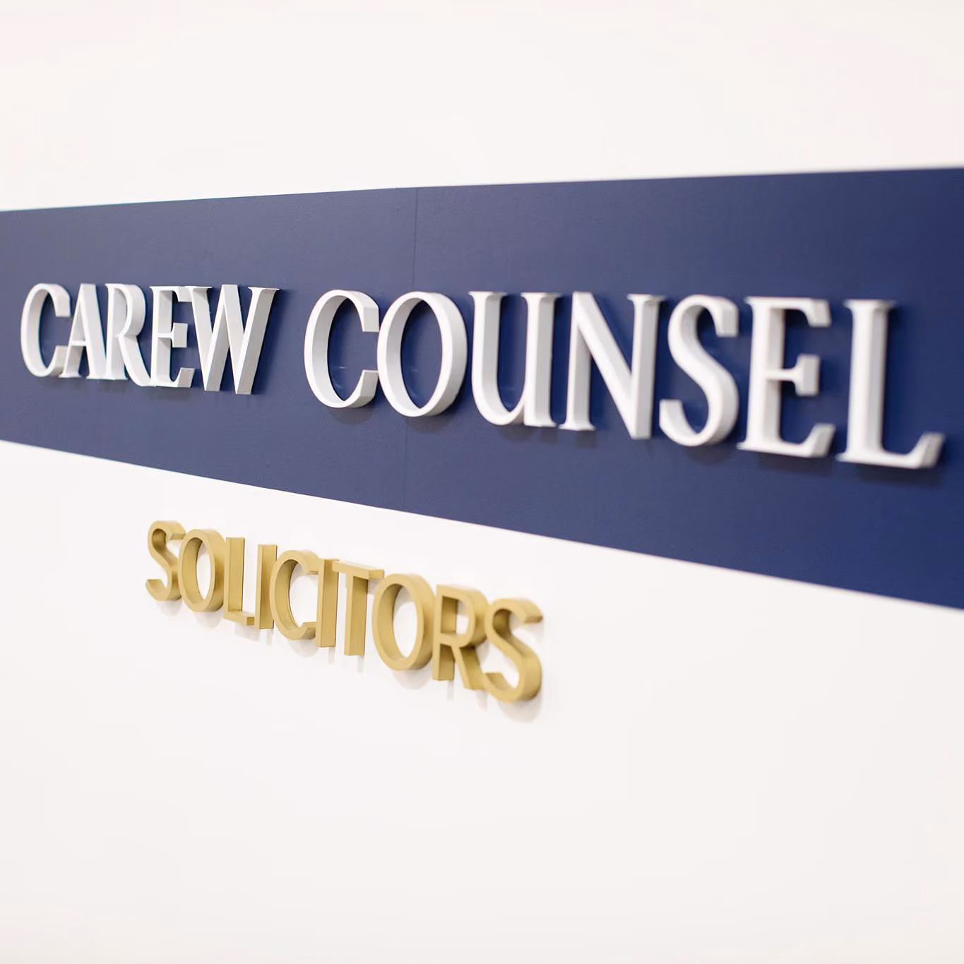 Our ‘Carew Counsel Solicitors’ logo, up on the wall at our Melbourne office.
