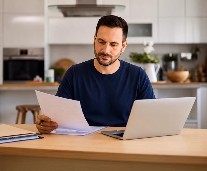 Person reviewing divorce paperwork and legal documents in Australia