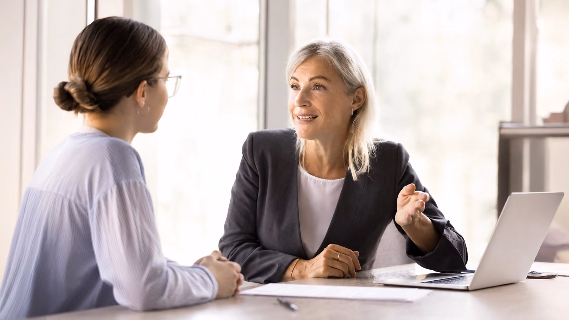 Family lawyer discussing divorce options with a client