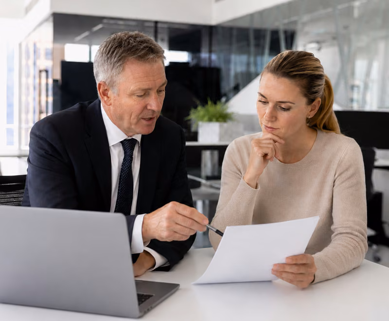 Person reviewing divorce papers with a family lawyer in Australia.