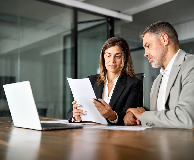 Person discussing family trusts and property settlement with a family lawyer.