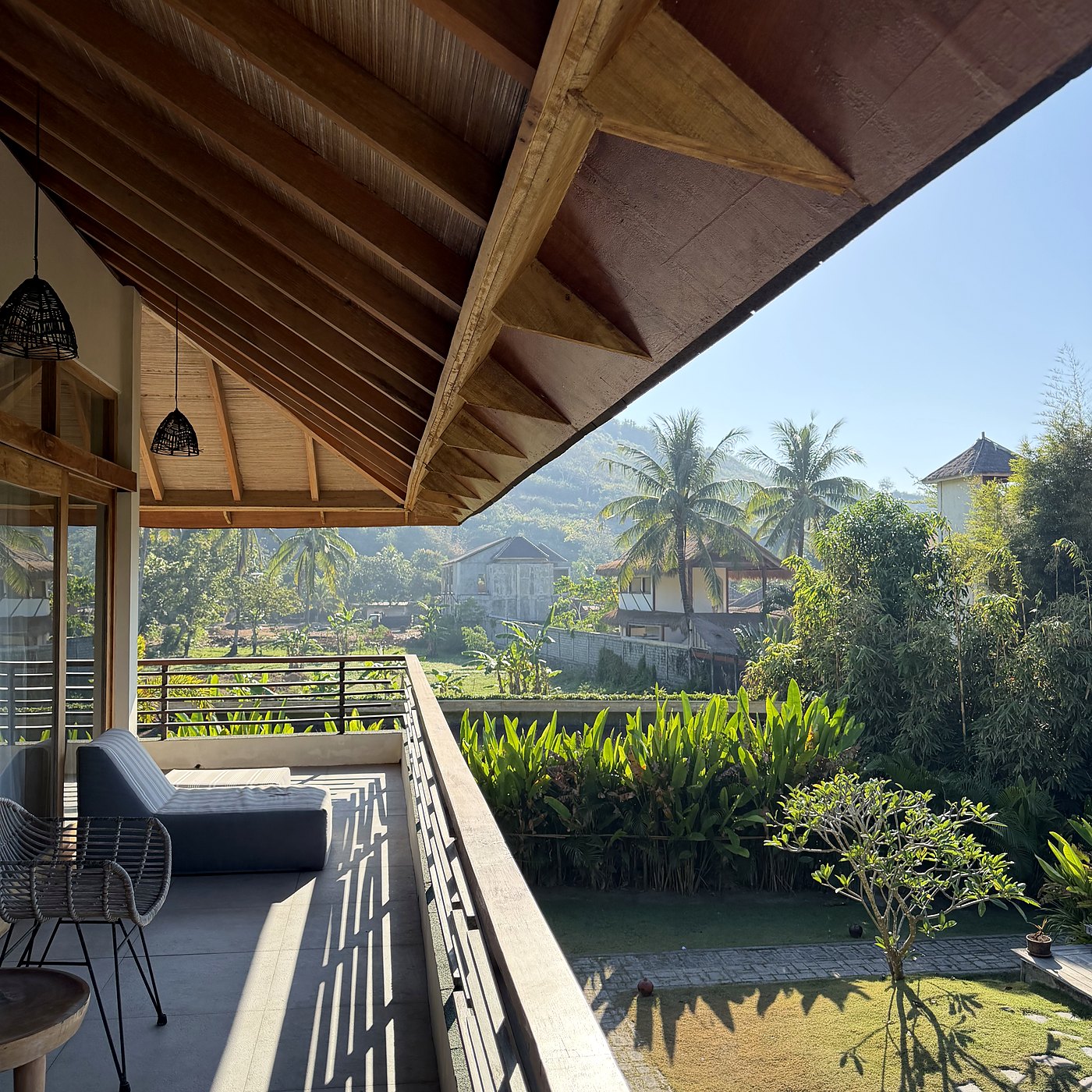 the balcony of a room, the view over the fields