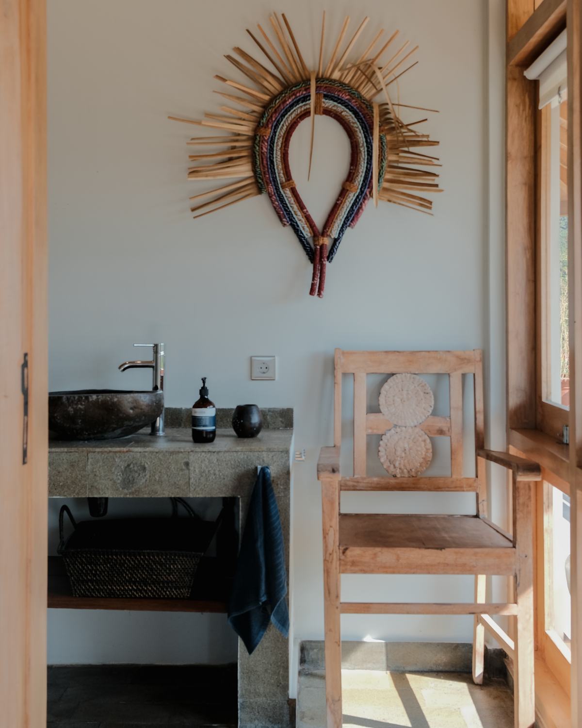 a stone basin in the morning sun