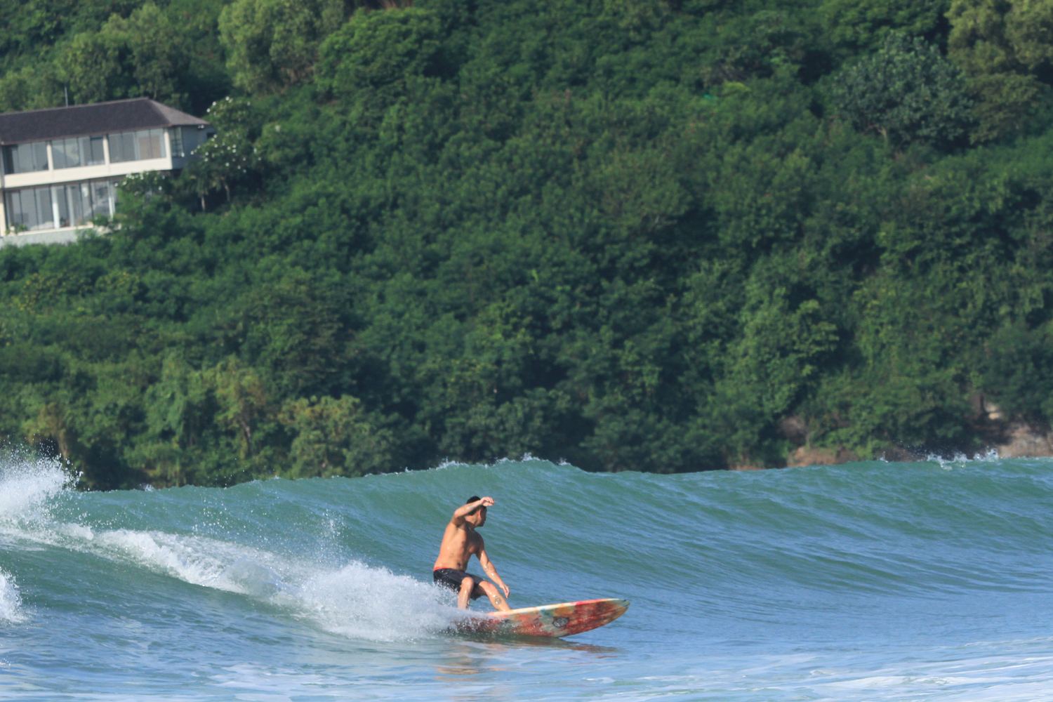 a clean wave in front of the villa