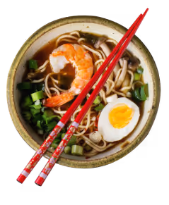 Bowl of ramen soup with noodles, shrimp, chopped green onions, a halved boiled egg, and red chopsticks resting on the bowl.