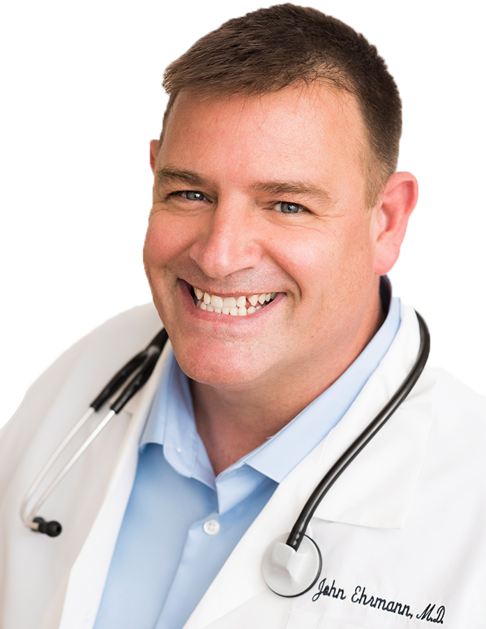 Dr. Manny Hernandez, M.D., a mature man with short gray hair and glasses, wearing a gray medical coat with a stethoscope and a striped tie.