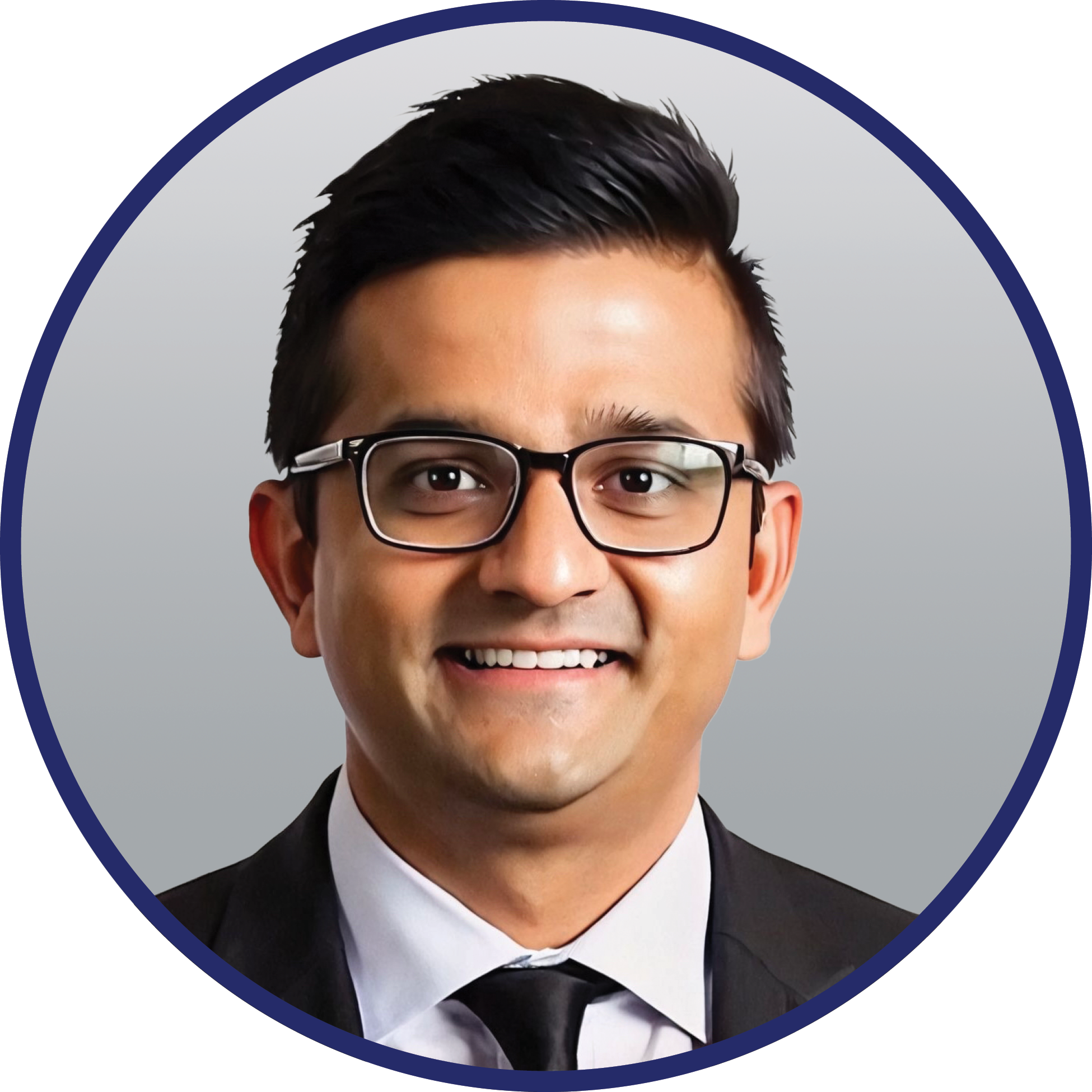 Headshot of Megan Depecol, a Caucasian woman with long curly brown hair, smiling and dressed in a navy blue suit jacket and grey shirt, set against a grey background.
