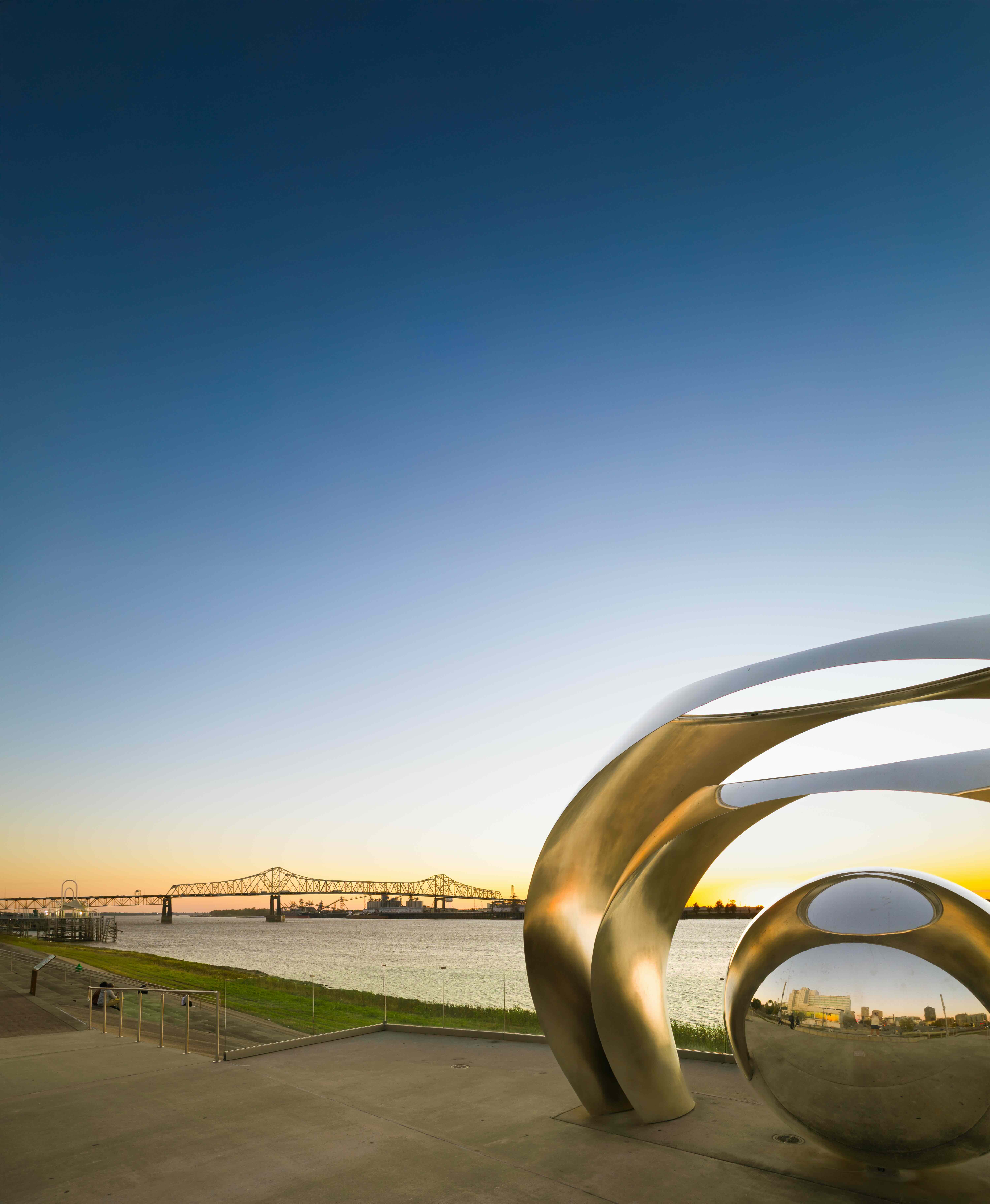 Sing the River Sculpture with the Mississippi River Bridge in the Background