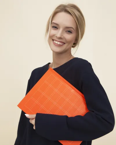 The woman is smiling
