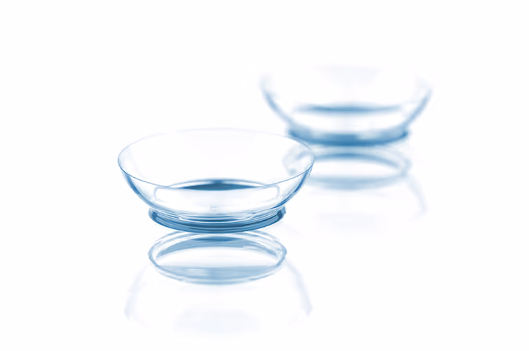 A couple of glass bowls sitting on top of a table
