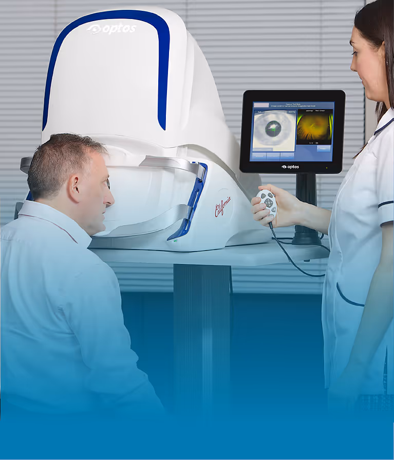 A man and a woman looking at a computer screen