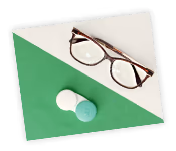 A pair of glasses sitting on top of a piece of paper