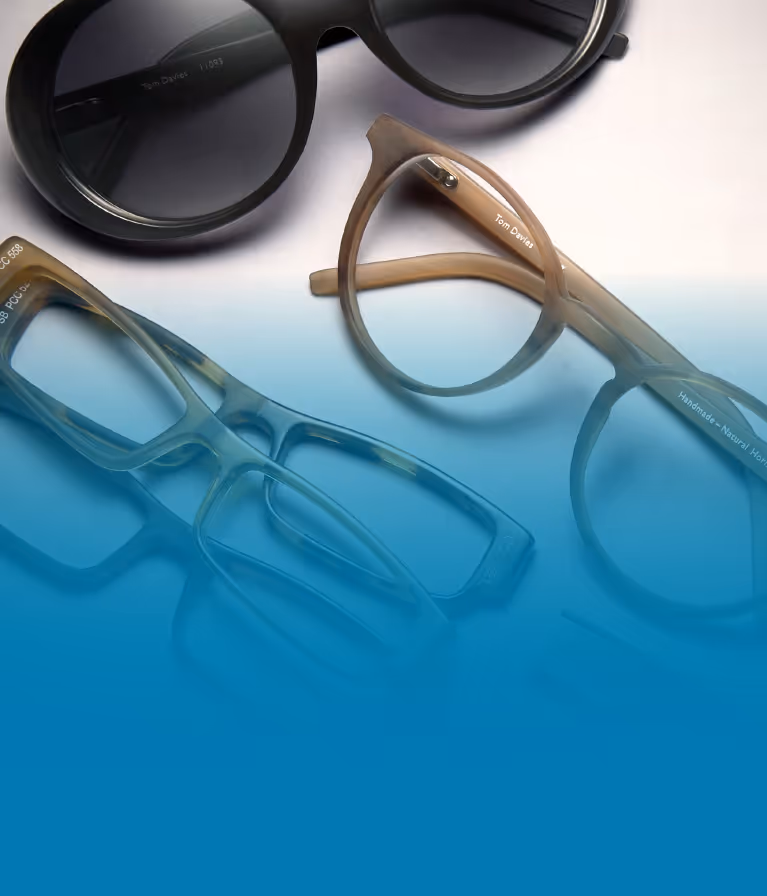 A pair of glasses sitting on top of a table